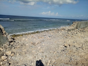 Project operator has been stopped after demolishing seawall without any permission to build beach club at Senderan Beach, Nusa Penida.