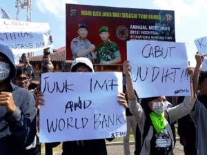Peaceful demonstration in front Denpasar Police station, hours before the start of the IMF event