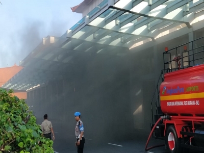 Fire caused chaos and panic at domestic terminal , Denpasar Airport.